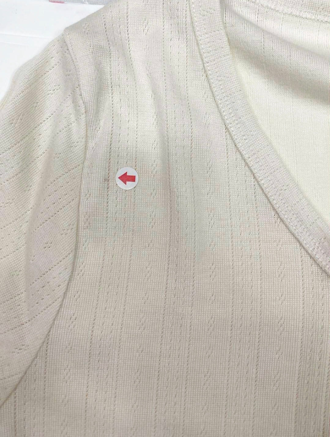 Cream cardigan (small defect)